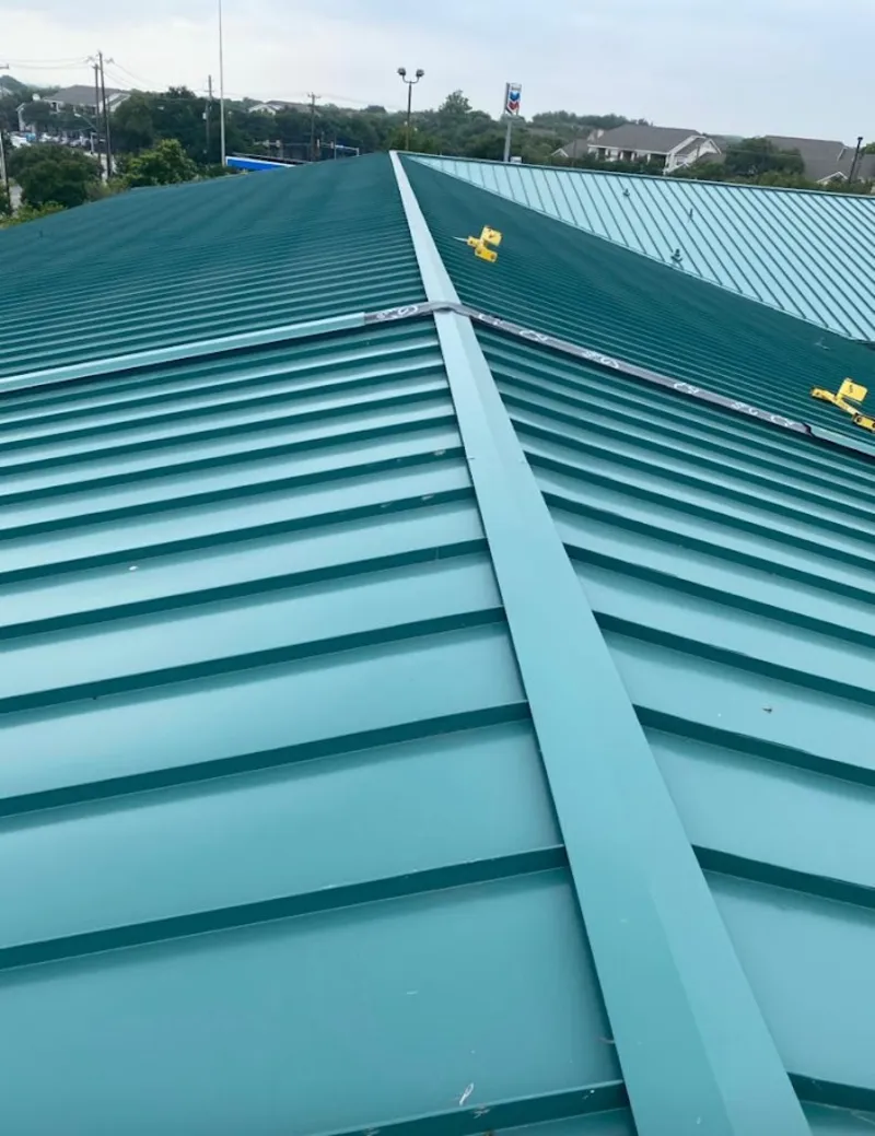 Green commercial metal roof ridge and valley for Metal Roof Repair in Central City