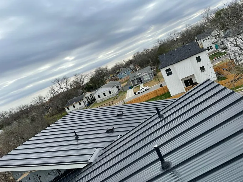 Standing seam metal roof panels with vents for Skylight Repair in Central City
